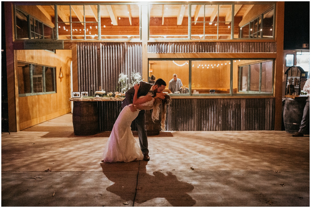 groom dips bride during first dance | glenwood treefarm tacoma washington photographer