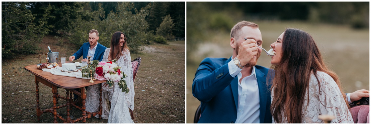 bride and groom at table with groom feeding bride | Gold Creek Pond Washington Elopement Photographer