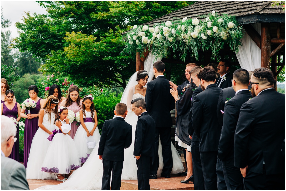 bride and groom during wedding ceremony | Hidden Meadows Wedding Snohomish Washington