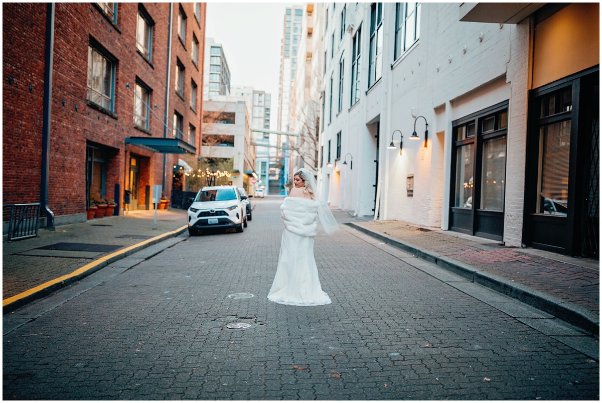 bride standing in alley