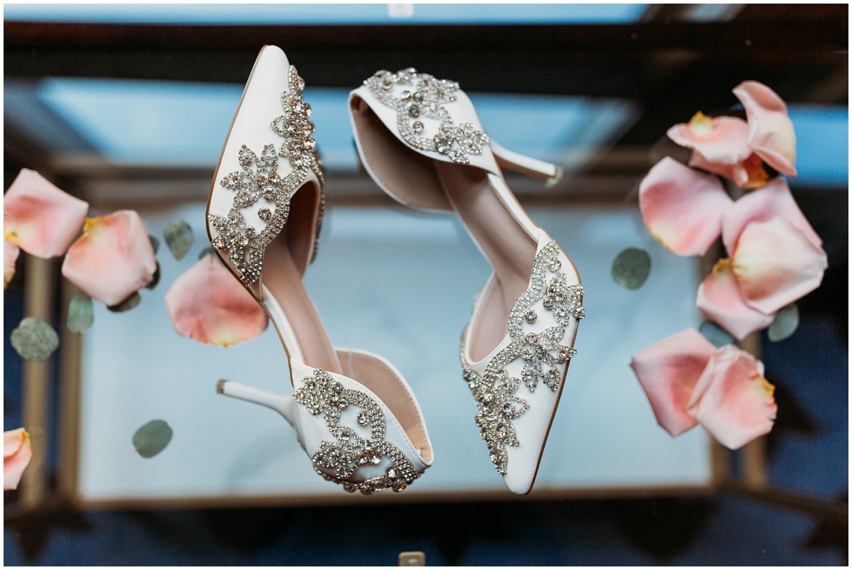 bride shoes and petals