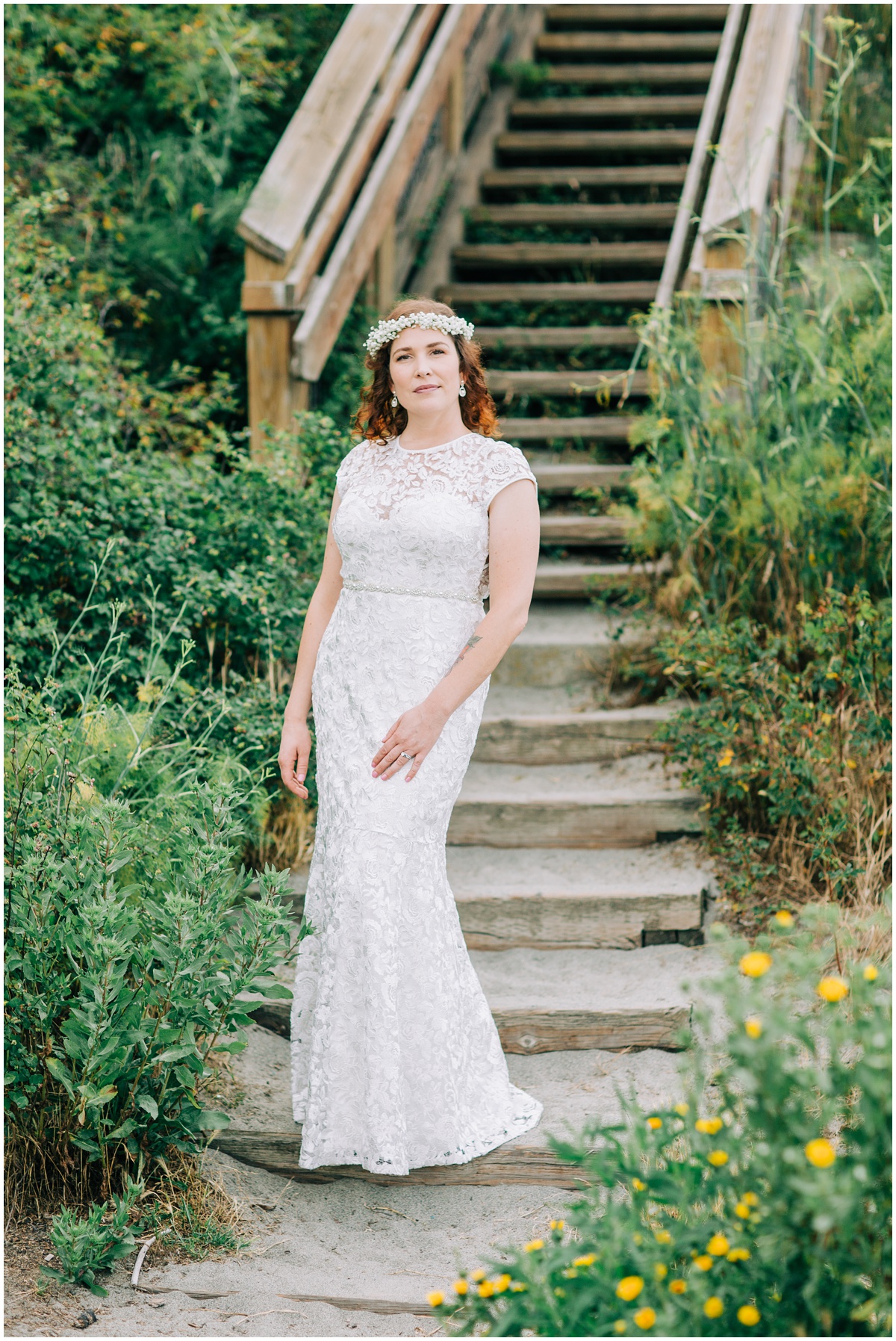 bride posing by stairs