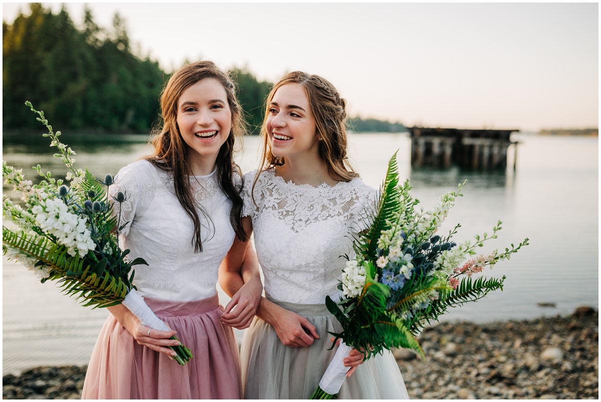 two brides laughing with each other